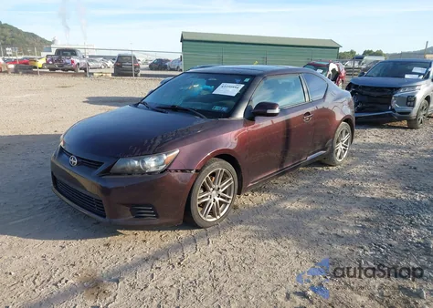 2011 Scion Tc z USA, uszkodzony, nr VIN JTKJF5C73B3014204